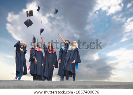 education, graduation and people concept - silhouettes of many h