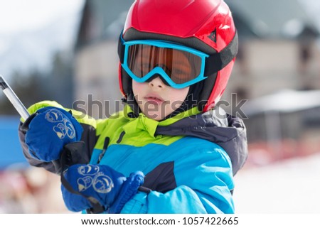 portrait of a boy in ski clothing