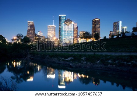 Downtown Houston in the evening. Reflection in the river Buffalo Bayou. Texas, United States