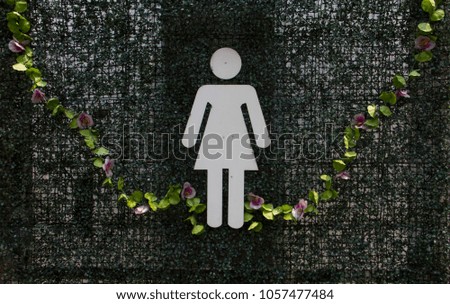 Women's toilet sign in the park