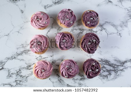 Lilac capcake with jam