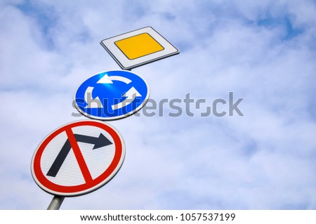 Priority, no turning right and moving round road signs