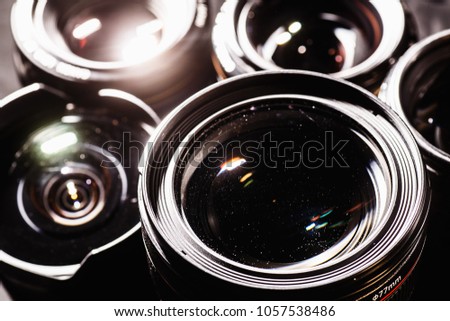 Dust to Lenses for Camera
 dslr on a dark background (close top view). Set