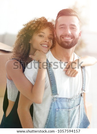 Close-up portrait of a newly-married couple in work clothes