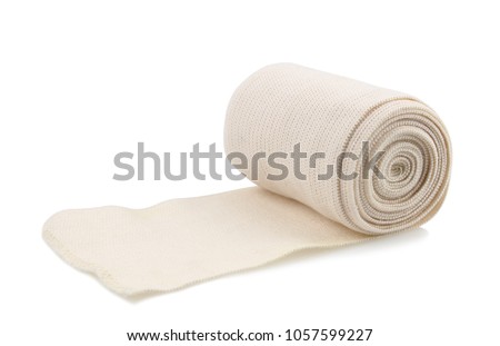 Medical bandage roll isolated on white background. Royalty-Free Stock Photo #1057599227