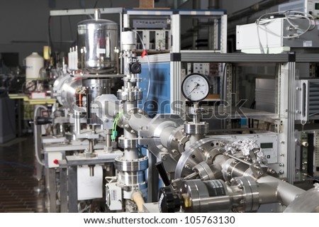 Important electronic and mechanical parts of ION Accelerator, CNC machined parts Royalty-Free Stock Photo #105763130