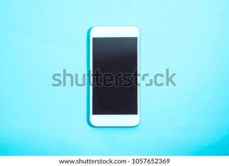 smartphone. light blue background.                             