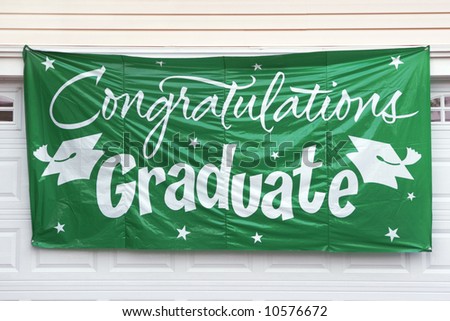 Graduation Congratulation Banner Hanging Outside Garage Door