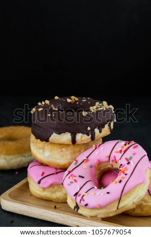 donuts on black background