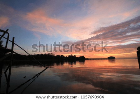 Background of colorful sky concept: Dramatic sunset with twilight color sky and clouds.
