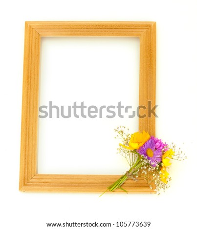 wooden frame with beautiful bouquet of bright  wildflowers, isolated on white