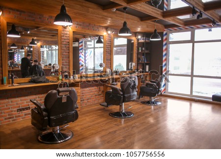 Stylish hairdressing salon interior Royalty-Free Stock Photo #1057756556
