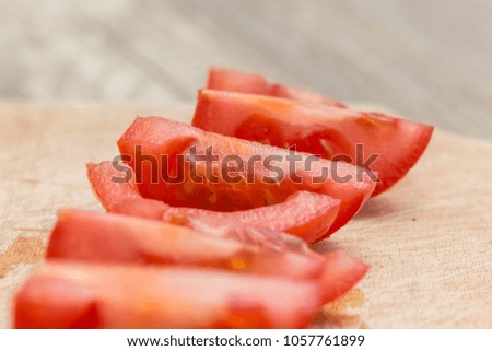 Fresh tomato slices in pieces