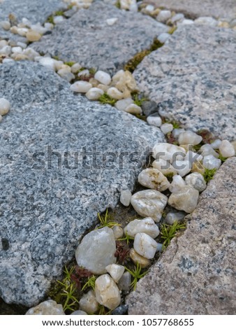 Stone blocks and pebble textured backround