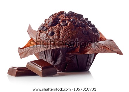 Chocolate muffin in brown paper with chocolate pieces isolated on white background Royalty-Free Stock Photo #1057810901