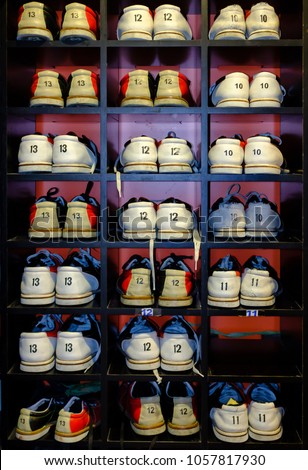 rack with shoes for bowling in different sizes