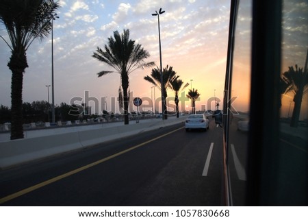 Road trip on the road of Saudi arabia in summer while sunset