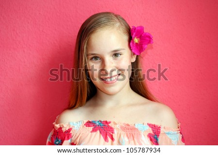 A beautiful blond-haired 13-years old girl, portrait