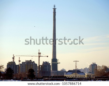 unfinished TV tower in Russian city of Ekaterinburg several seconds before the demolition explosion and epic fall