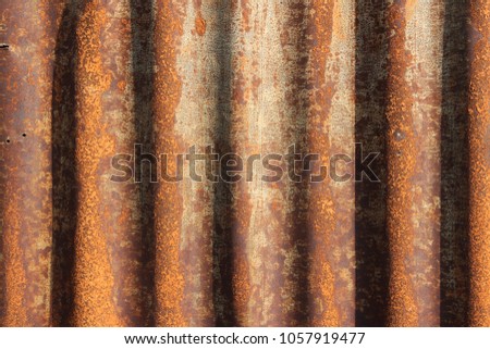 Metal background - retro style grungy corrugated steel tin texture.