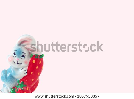 Background for text and kids. Ceramic bunny figure on pink banner.