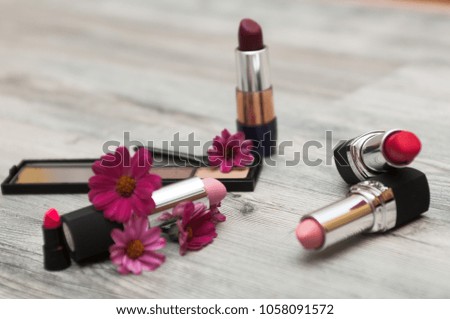 Make-up brush explosion on background