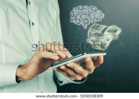 Human brain with gears and money