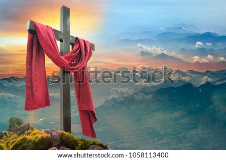 Christian cross against the sky over the mountains Royalty-Free Stock Photo #1058113400