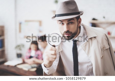 Private detective agency. Man in hat and cloak is posing with magnifying glass, woman is holding her daughter.
