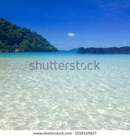 Tropical beach getaway on a small island in Thailand