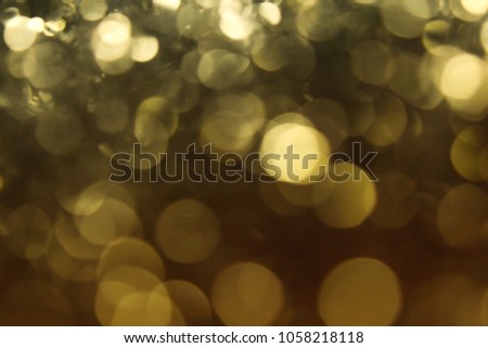 Gold abstract bokeh background, Festive xmas abstract background with bokeh defocused lights and stars