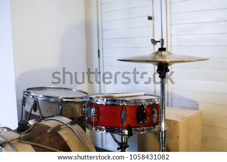 Drums in the house  in the guestroom with high hat snare and sticks