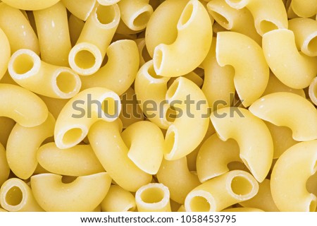 Pasta background or texture. Macro shot is made by means of stacking technology