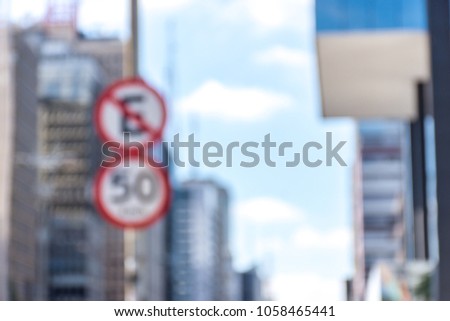 Semaphore image and signs with blur effect traffic sign