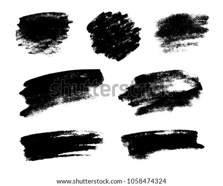 Set of black grunge brushes as vector paint strokes for textures overlay. Artistic ink blots isolated on white background