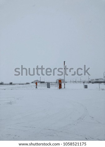 A petrol station completely covered in snow in Iceland
