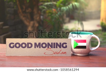 Sudan flag on the tea cup with a good morning message