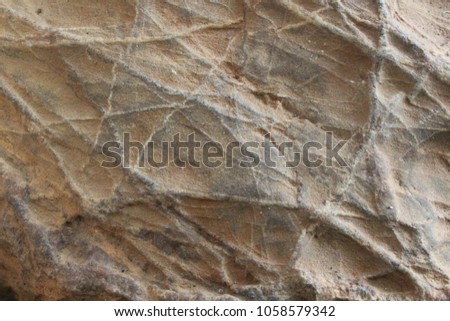 Lines and patterns on the surface of natural stone.