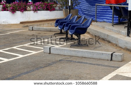 Blue seat for customer service outdoor