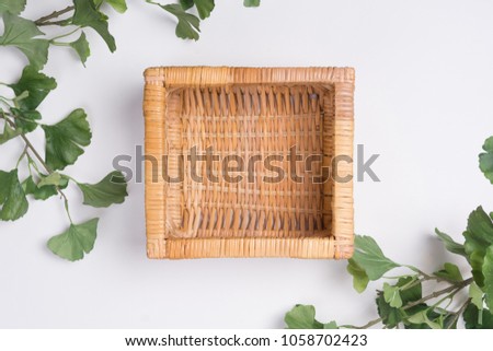 Wicker Basket with Branches Flat Lay Top View