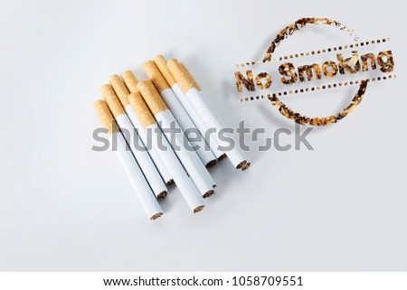 Cigarette with tobacco on white background, No Smoking tag with 