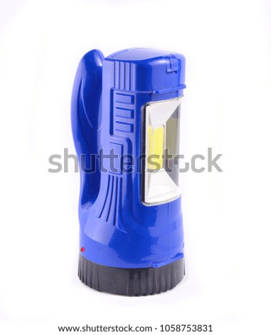 Blue flashlight isolated on white background
