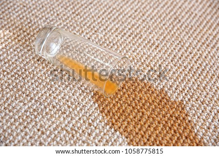 Spilled juice on carpet