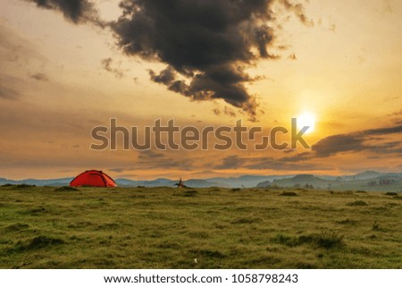 Landscapes in Carpathian mountains,morning coffee and travel tent