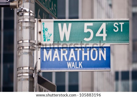 Marathon Walk street sign in New York City, located at the corner of West 54th St. and 6th Avenue in Manhattan.