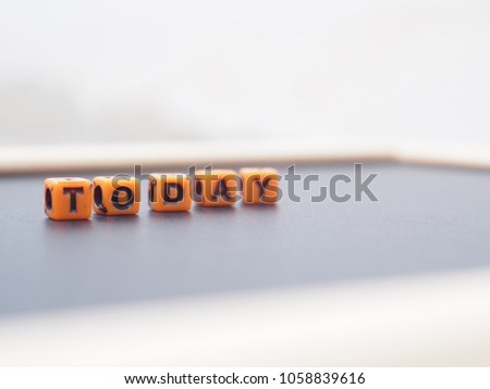 The bead is the word Today and blur background