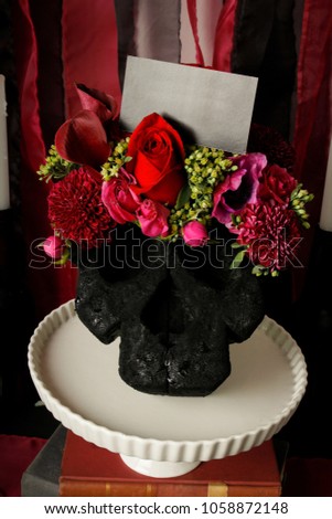 human skulls red roses and pink peonies, Halloween party flower decorations with card