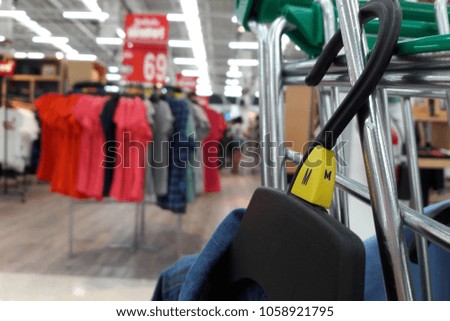 New shirt that customer buy. Hang in the shopping cart