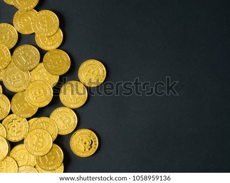 top view of stack golden Bitcoins on black background with copy space, CryptoCurrency concept