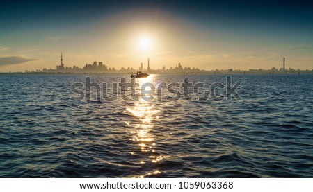 Scenic view of Lake Ontario and city skyline, Toronto, Canada